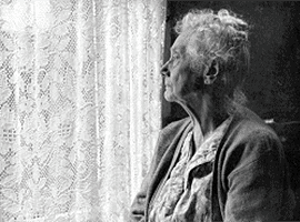 woman looking out of a window